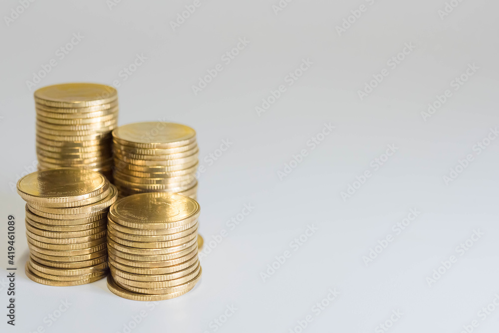 Gold coins stacks is representing riches and wealth management. Coin stack growing and find out the way to get a return on investment. Finance and money exchange investment as concept. Gold coins stacks is representing riches and wealth management. Coin stack growing and find out the way to get a return on investment. Finance and money exchange investment as concept.