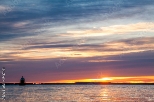 dramatic sunrise landscape photo in Sandy Point State Park,  Chesapeake Bay, Maryland. © Nathaniel Gonzales
