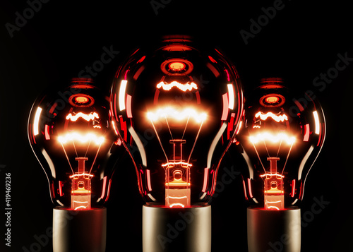 Three red luminous incandescent bulbs on a black background. 3D rendering and 3D illustration.
