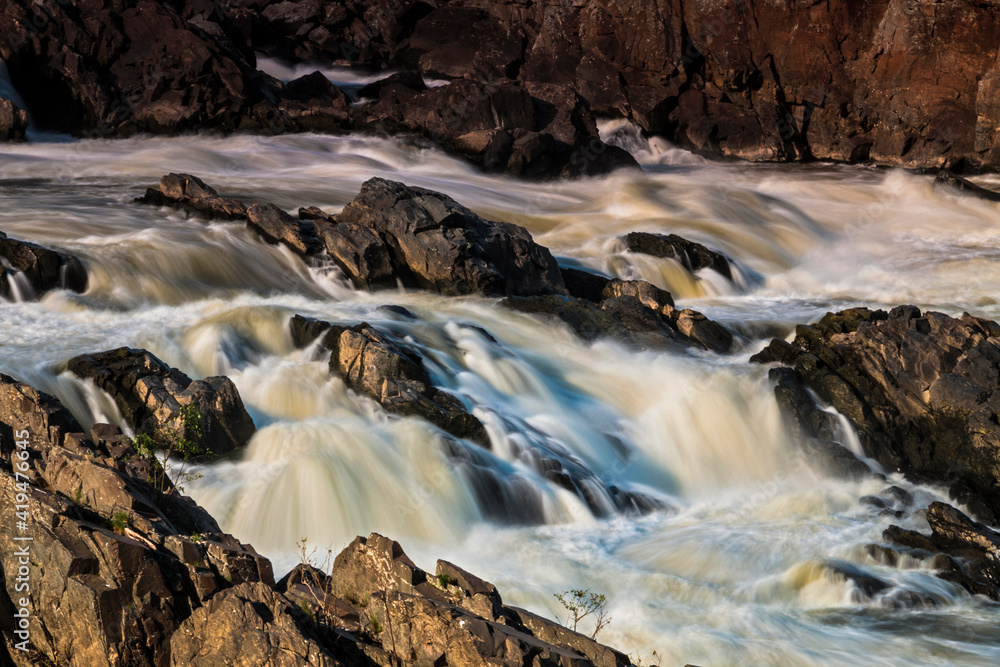 dramatic images of powerful river flow of the Potomac River in Great Falls National Park in Maryland and Virginia. dramatic images of powerful river flow of the Potomac River in Great Falls National Park in Maryland and Virginia.
