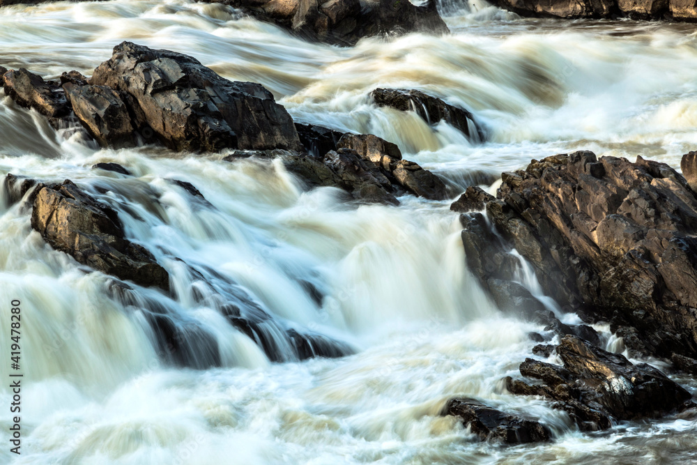 dramatic images of powerful river flow of the Potomac River in Great Falls National Park in Maryland and Virginia. dramatic images of powerful river flow of the Potomac River in Great Falls National Park in Maryland and Virginia.