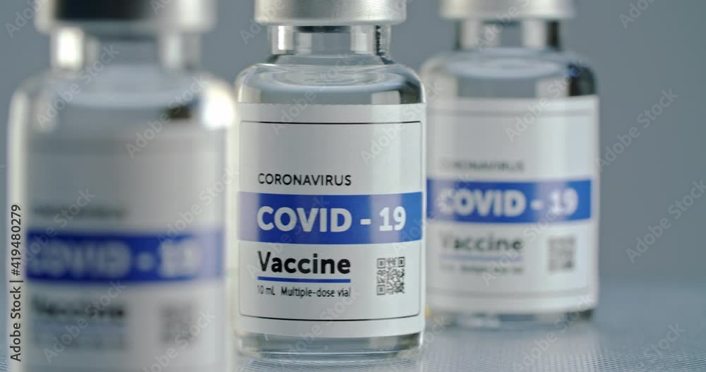 close up Covid-19 Vaccine vile slight pan across, filmed in 4K RAW close up Covid-19 Vaccine vile slight pan across, filmed in 4K RAW