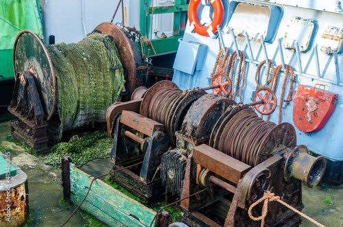 Old rusty pulleys on an abandoned ship