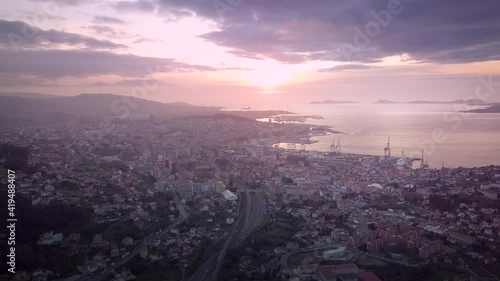 Wallpaper Mural Beautiful aerial sunset view over industrial cityscape at the atlantic coast in Galicia with the Cies island in the background. Drone Stablishing shot in Vigo city. Torontodigital.ca