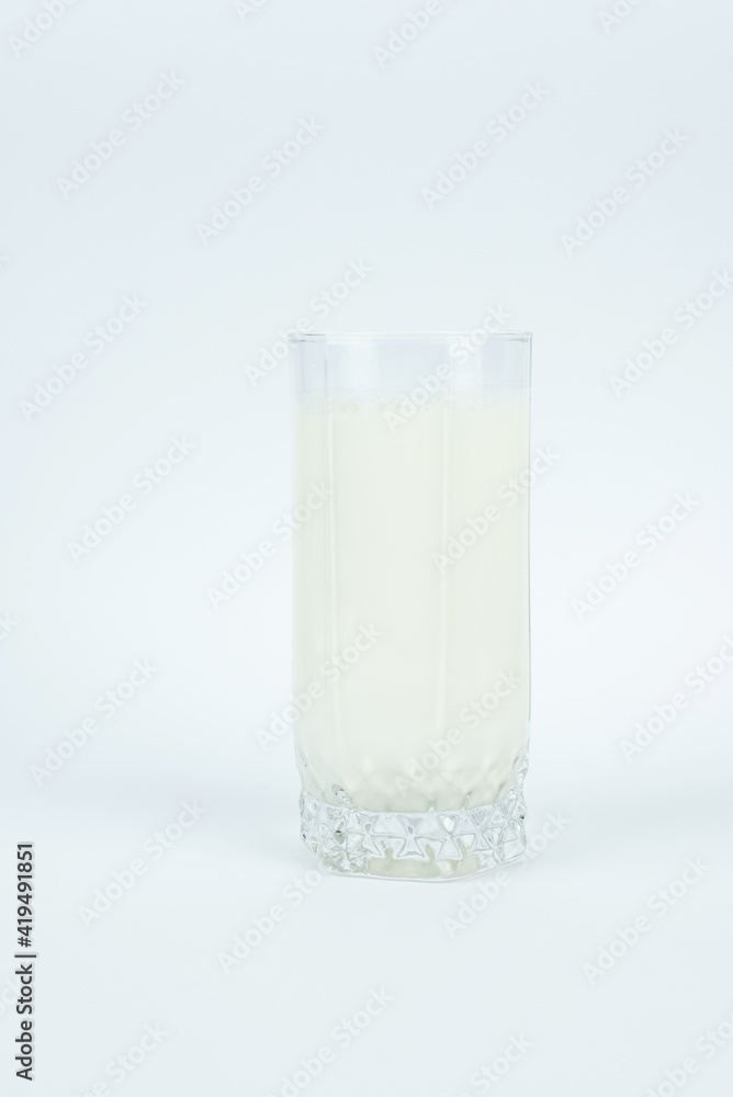 A glass of milk on the white background A glass of milk on the white background