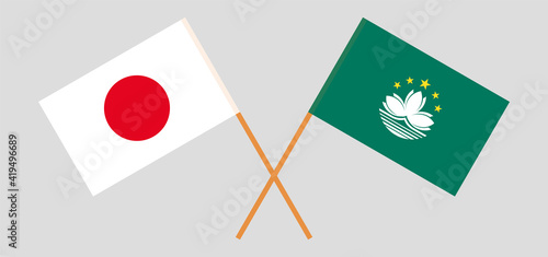 Crossed flags of Japan and Macau. Official colors. Correct proportion