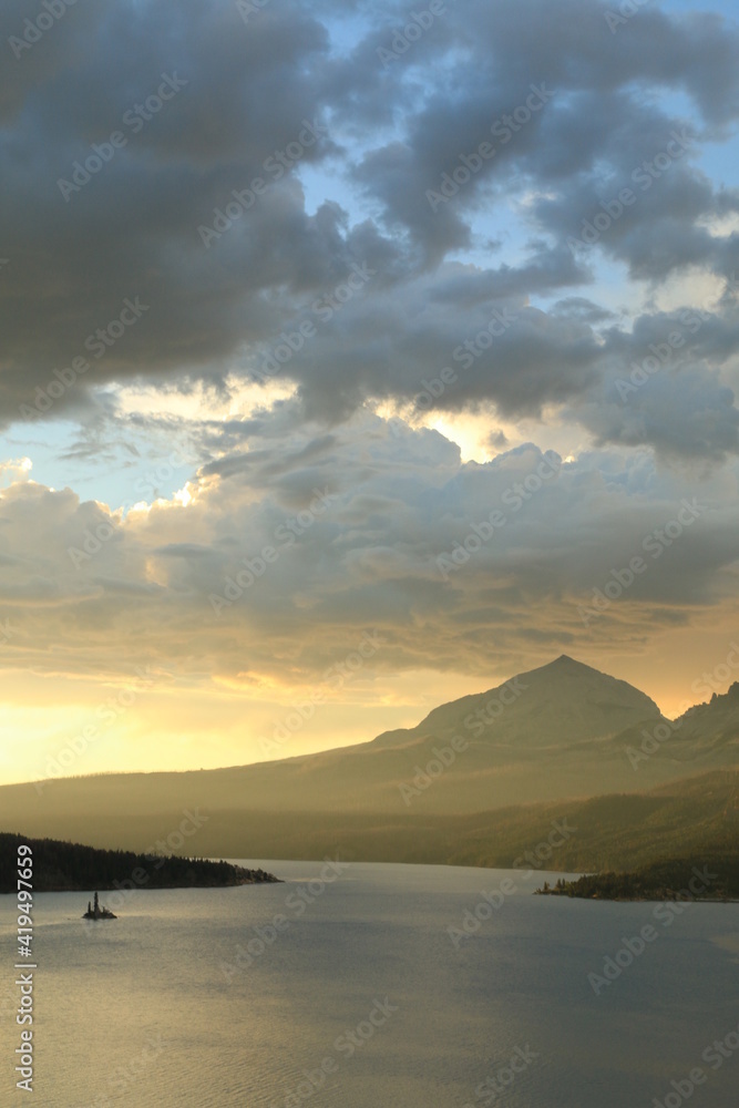 dramatic summer mountain ranges and mountain peaks in the vast Glacier National Park in Montana. dramatic summer mountain ranges and mountain peaks in the vast Glacier National Park in Montana.