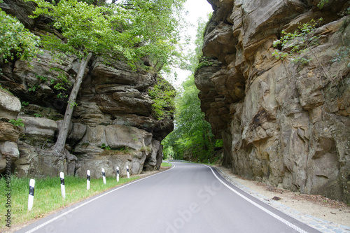 Road between rock formations in Luxembourg country photo