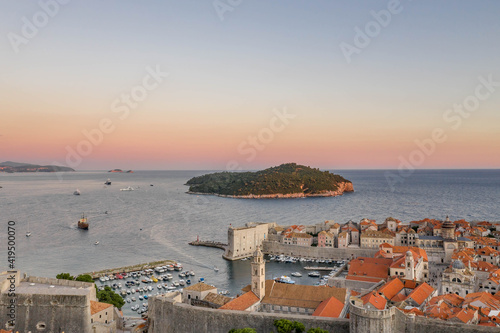 Aerial drone shot of Otok Lokrum in Dubrovnik in Croatia summer sunset golden hour