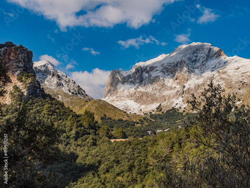 mountains with snow  and clouds in the tramuntana area on the balearic island of mallorca  spain