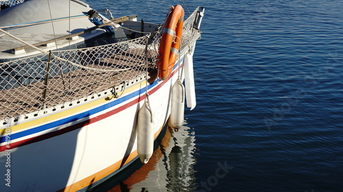 sailboat keel reflection in the harbor water © Esteve