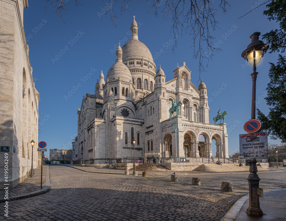 Paris, France - 02 26 2021: Montmartre district. View of the Basilica of sacred heart