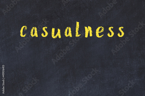 College chalk desk with the word casualness written on in