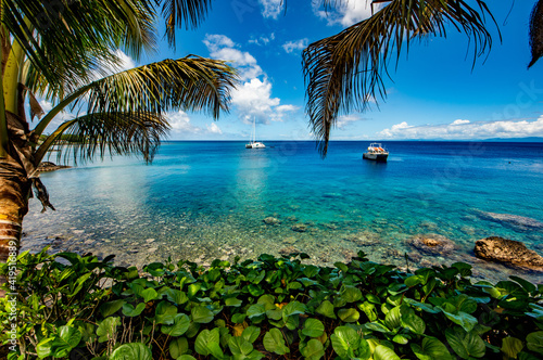 Paradise Taveuni, Fiji, Pacific Ocean, Tropical island, resort, boats at anchor, calm water, palm trees, clear water, coral reef, holidays, vacations, Greg Hills photographer, @oceansoldiers, clouds, 