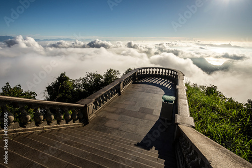 Beautiful sunrise from Christ Statue monument to city under clouds photo