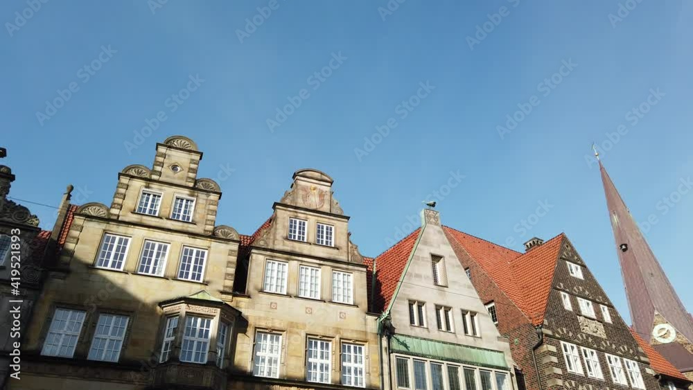 Bremen marketplace panning with old historic merchant houses and Bremen town hall UNESCO World Heritage Site Bremen marketplace panning with old historic merchant houses and Bremen town hall UNESCO World Heritage Site