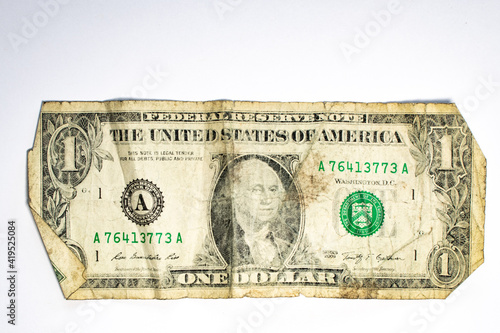 Worn old  ragged US one dollar bill