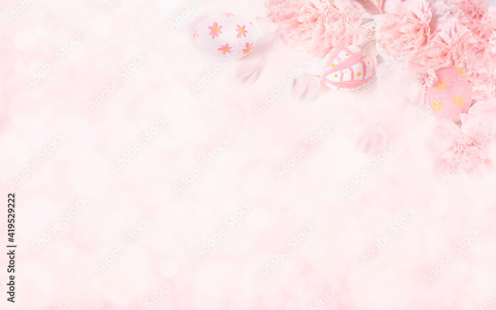  Easter eggs with pink flowers on on pastel pink background