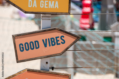 signpost with the phrase good vibes in Rio de Janeiro.