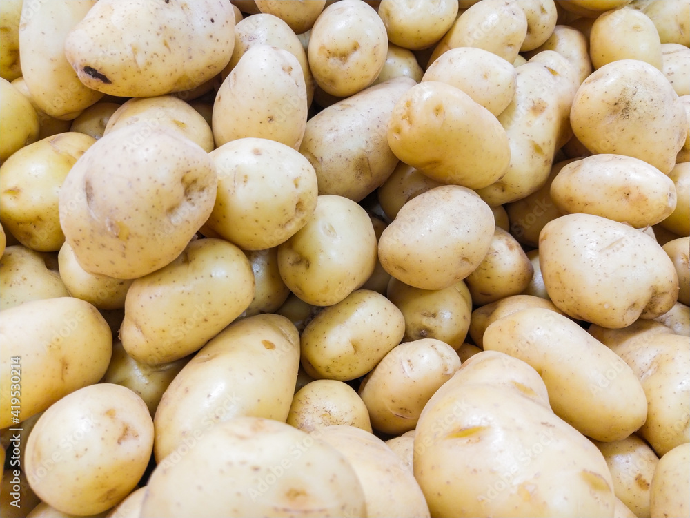 known vegetable with potato, on a stall at an open market in Rio de Janeiro. known vegetable with potato, on a stall at an open market in Rio de Janeiro.