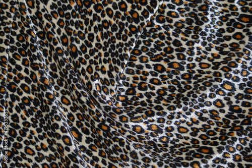 closeup of texture of print fabric stripes leopard