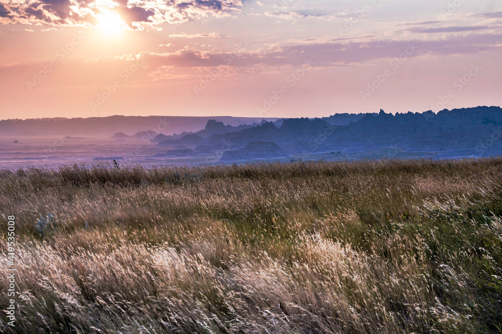 dramatic summer sunset in the Badlands national park in South Dakota.