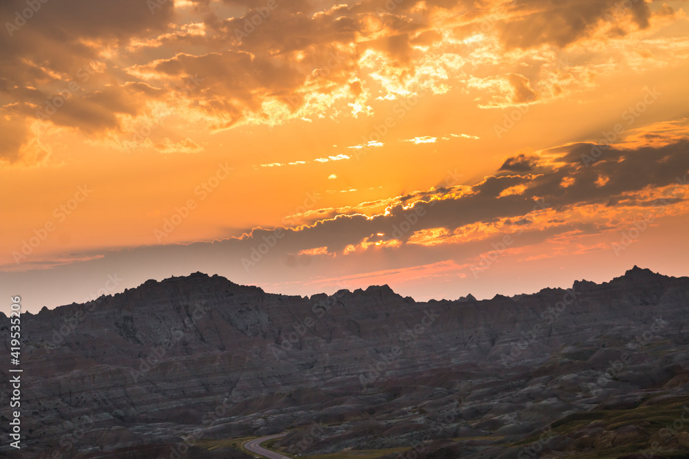 dramatic summer sunset in the Badlands national park in South Dakota.