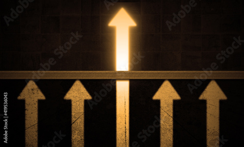 Business arrow concept in grungy dark concrete wall, Unstoppable arrow upward Break his way through the wall line. challenge and competition, leadership and power. Courage and curiosity concept photo