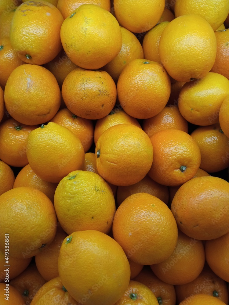 Orange fruit in the supermarket Orange fruit in the supermarket