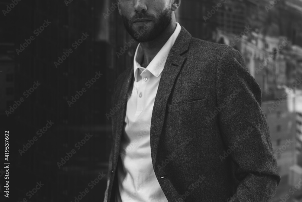 Fototapeta premium Businessman in formal attire black and white closeup portrait