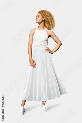 Beautiful woman in tank top and maxi skirt simple summer fashion full body shoot © Rawpixel.com