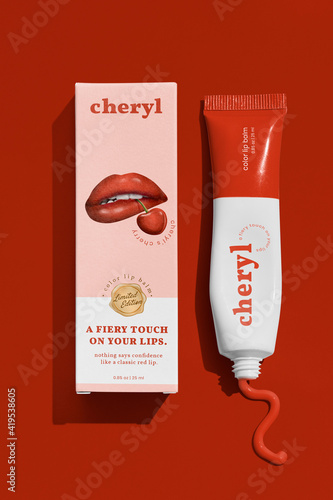 Red lipstick packaging for cosmetic branding photo