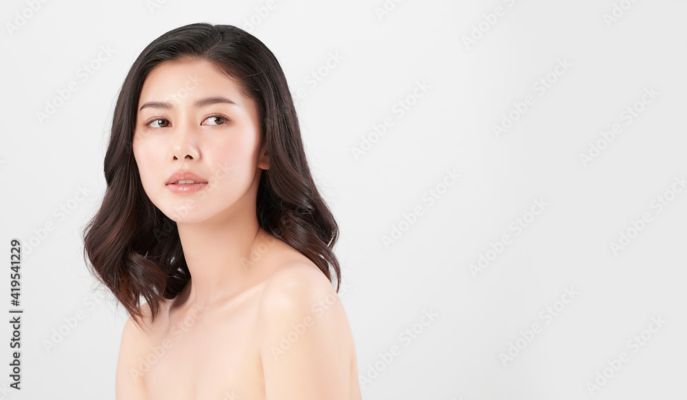 Beautiful young asian woman with clean fresh skin on white background, Face care, Facial treatment, Cosmetology, beauty and spa, Asian women portrait Beautiful young asian woman with clean fresh skin on white background, Face care, Facial treatment, Cosmetology, beauty and spa, Asian women portrait