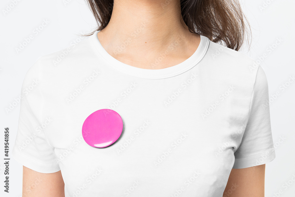 Pink empty badge pin on woman&rsquo;s t-shirt with design space - obrazy, fototapety, plakaty 
