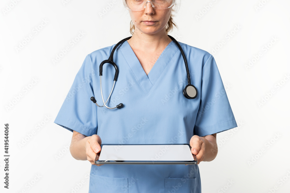 Doctor using tablet to diagnose medical technology Doctor using tablet to diagnose medical technology