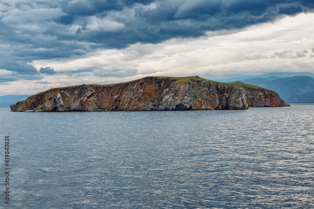 Lake Baikal in cloudy weather. Cold summer