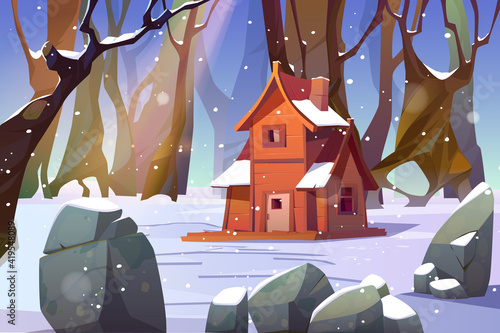 Wooden house in winter forest. Old shack in wood