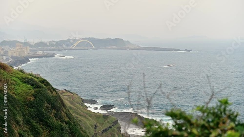 Timelapse view of Badouzi Fishing Harbor. photo