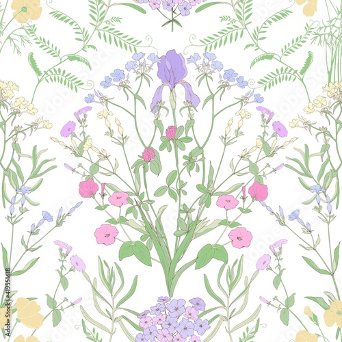 Floral symmetrical pattern on a white background. Beautiful vector pattern with irises, petunias and phlox and clover.