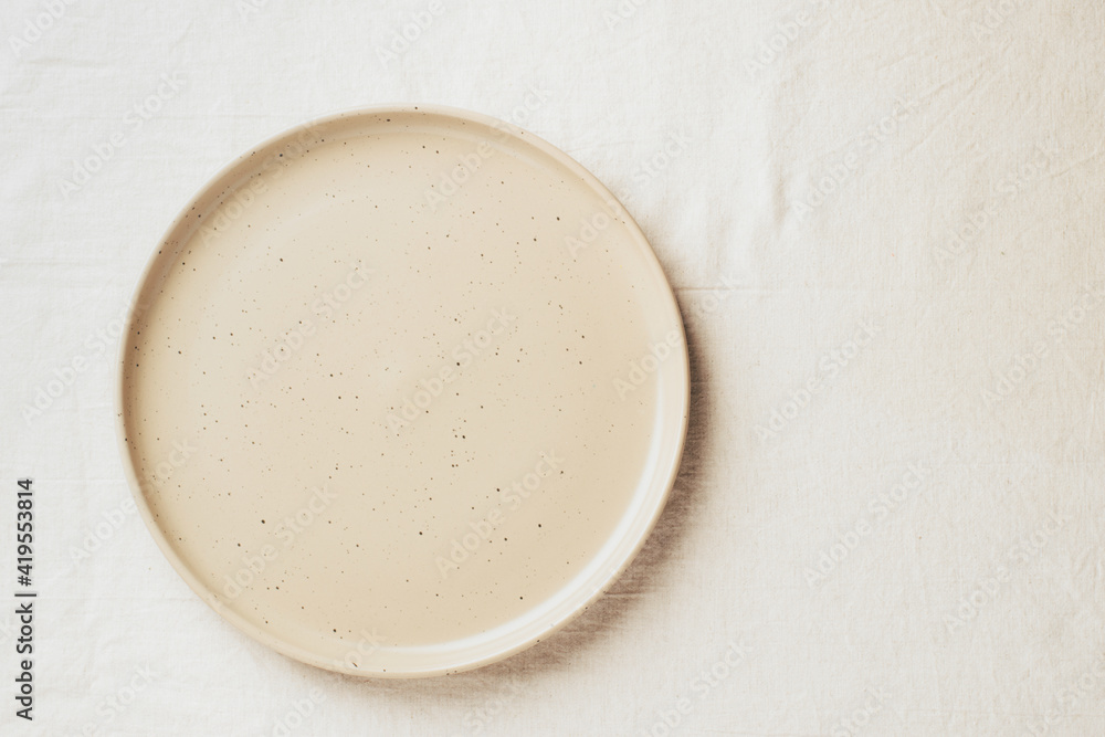 Empty ceramic shape plate for food on the table top view. Copy space template for your text Empty ceramic shape plate for food on the table top view. Copy space template for your text
