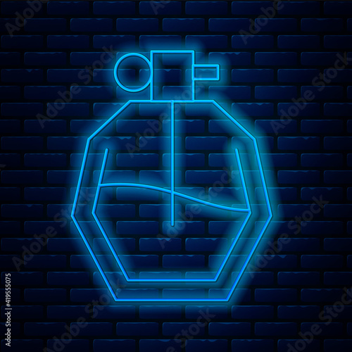 Glowing neon line Perfume icon isolated on brick wall background. Vector Illustration.
