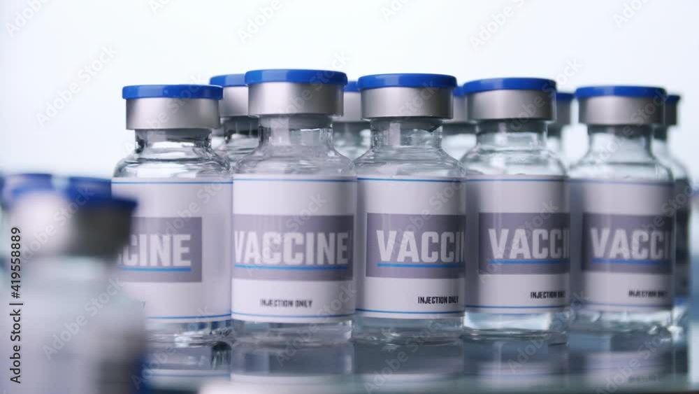 Glass vials for vaccine in laboratory. Group of vaccine bottles. Medicine in ampoules. Glass vials for vaccine in laboratory. Group of vaccine bottles. Medicine in ampoules.