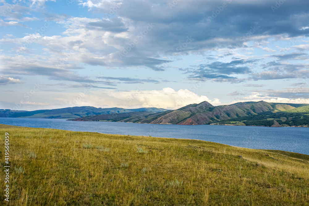 Evening sunset over the mighty Siberian river Yenisei Evening sunset over the mighty Siberian river Yenisei