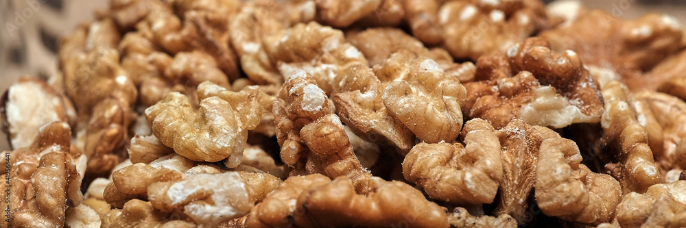walnut kernels close-up, shallow depth of field, blurred background walnut kernels close-up, shallow depth of field, blurred background
