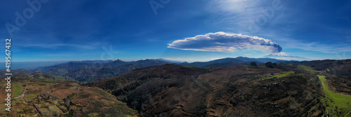 Virtual reality panorama at 180 degrees of the eruption of the Etna volcano by day 19 February 2021 seen from the megalithic complex of Argimusco near Montalbano Elicona. Paroxysm on Etna in Sicily. 