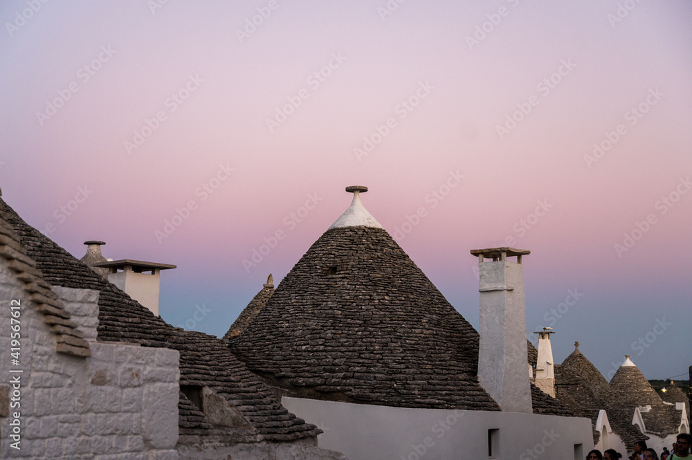 roofs of traditonal trullis in Alberobello at twilight, Puglia