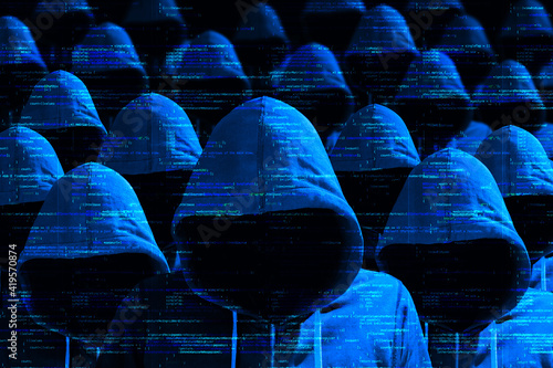Group of coded hooded hackers in blue cybersecurity concept