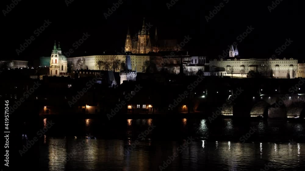 TTTPrague Castle and St. Vitus Cathedral and Charles Bridge on the Vltava River in the center of Prague at night TTTPrague Castle and St. Vitus Cathedral and Charles Bridge on the Vltava River in the center of Prague at night
