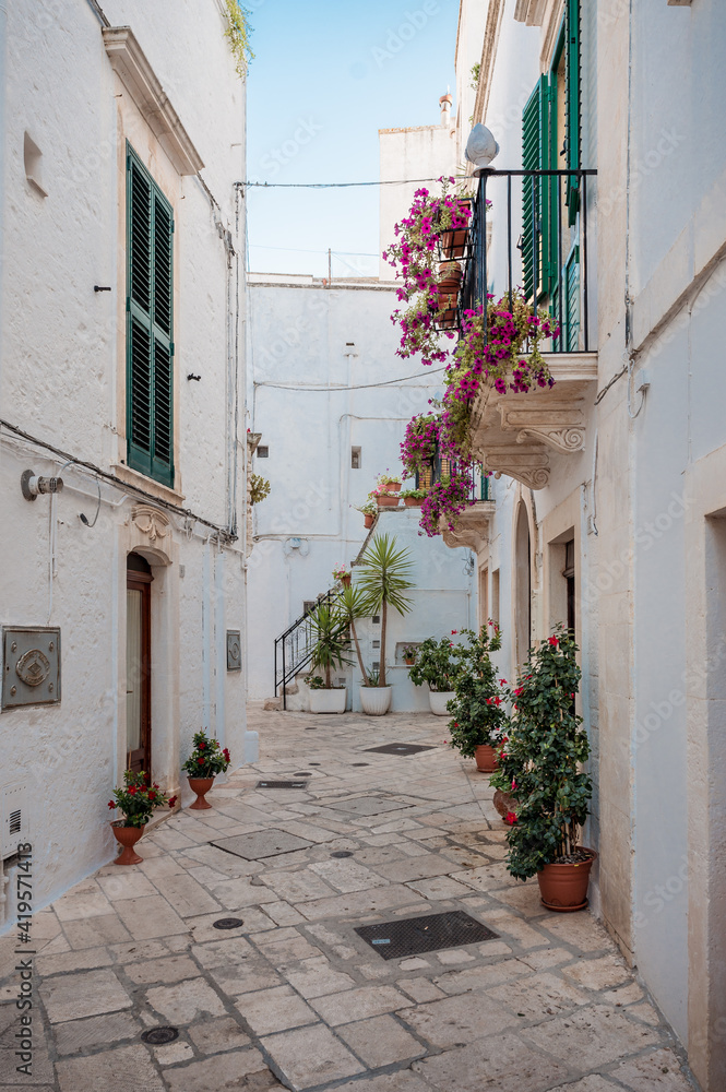 narrow alley in the picturesque oldtown of Locorotondo, Puglia