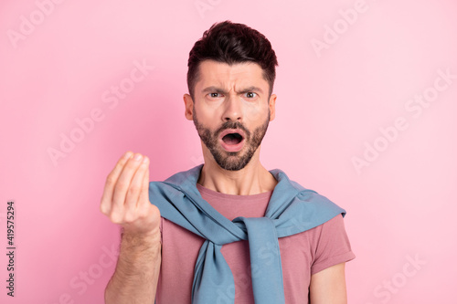 Photo of young crazy shocked amazed surprised man asking money debt crisis isolated on pink color background © deagreez